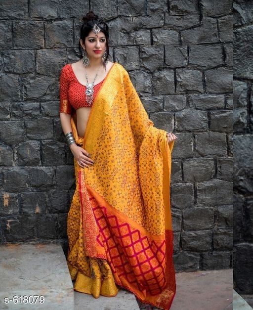 Gorgeous Red Yellow Patola Silk Zari Woven Sarees